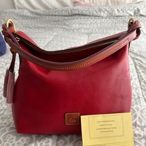 Dooney and Bourke Florentine Twist Strap Hobo.